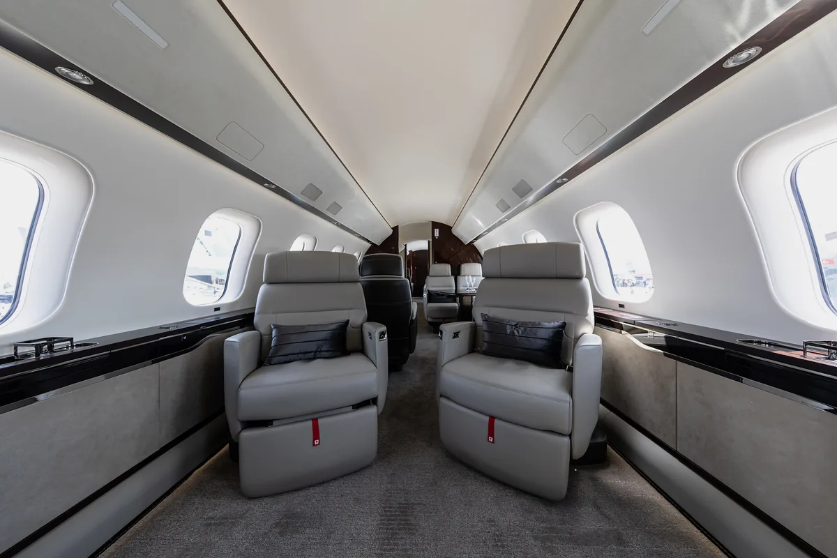 The cream leather club seats of a Bombardier Global 7500 cabin