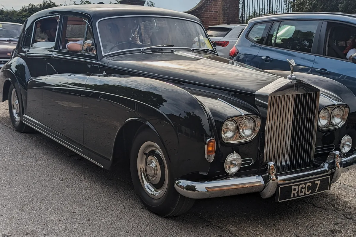 A black 1965 Rolls-Royce Phantom V limousine